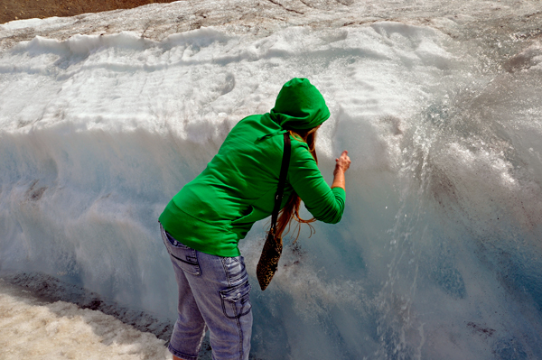 Karen Duquette drinking the water